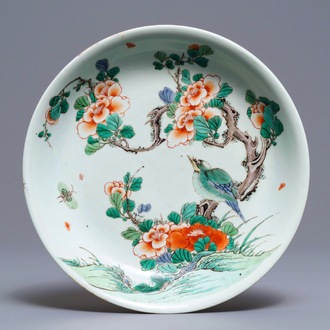 A Chinese famille verte dish with a bird among blossoms, Kangxi