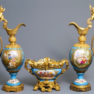 A pair of massive gilt bronze-mounted Sèvres porcelain ewers and a jardinière, France, 19th C.