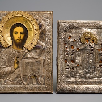 Two Russian silvered copper oklad or riza icons: 'Mother of God with apostles' and 'Pantocrator', 19th C.