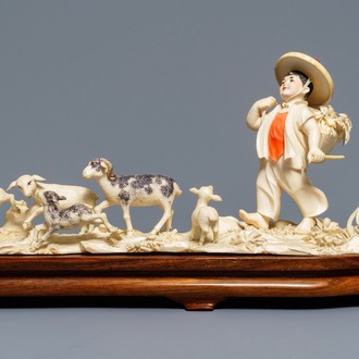 A polychrome Chinese ivory group with a shepherd, ca. 1940