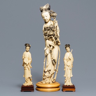 One large and a pair of smaller Chinese ivory figures of court ladies, ca. 1900