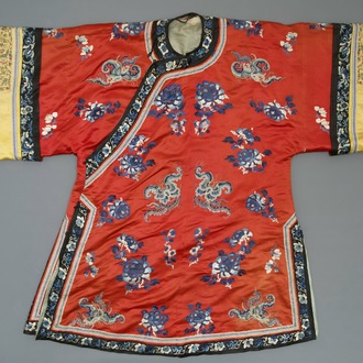 A Chinese woman's embroidered red silk side-opening informal coat, 19th C.