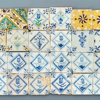 A varied collection of Spanish and Dutch Delft blue, white and polychrome tiles, 17th C.