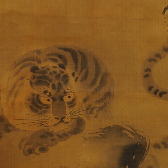 Japanese school, 18/19th C., after Kano Masanobu, ink on silk: A tiger on a rock