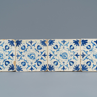 Four Dutch Delft blue and white 'snail' tiles, 1st half 17th C.