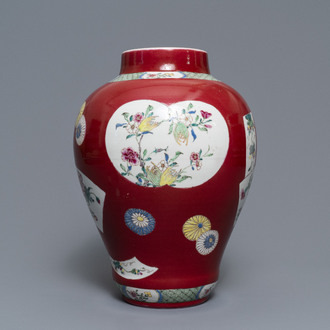 A fine Chinese famille rose ruby ground baluster vase with floral panels, Yongzheng