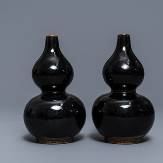 A pair of Chinese dark brown-glazed double gourd vases, Qianlong