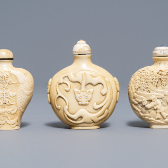 Three Chinese carved ivory snuff bottles, 19th C.