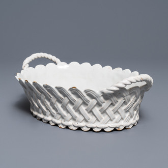 An oval monochrome white Brussels faience basket, 18th C.