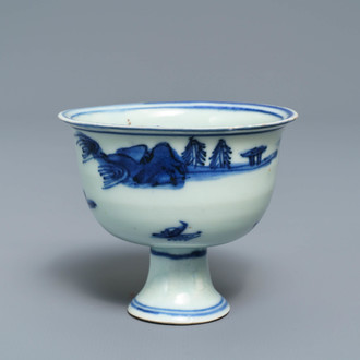 A Chinese blue and white stem cup with landscape design, Transitional period