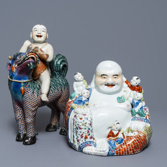 A Chinese famille rose figure of Buddha and a famille rose boy on qilin, 19th C.