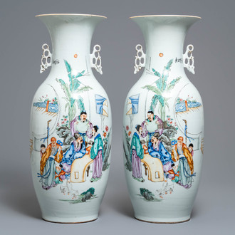 A pair of Chinese famille rose vases with scholars in a garden, 19/20th C.