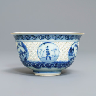 A Chinese blue and white reticulated bowl with landscape panels, Transitional period