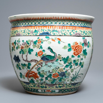 A Chinese famille verte fish bowl with birds among flowers, 19th C.