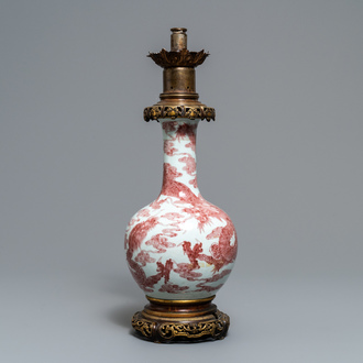 A Chinese underglaze red bottle-shaped 'dragon' vase with gilt-bronze mounts, 18/19th C.