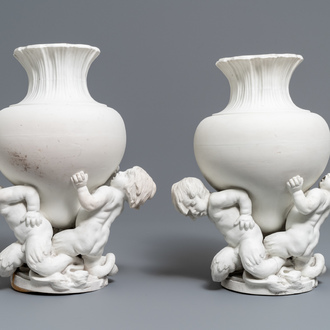 A pair of biscuit vases with young tritons, Saint-Amand or Tournai, 18th C.