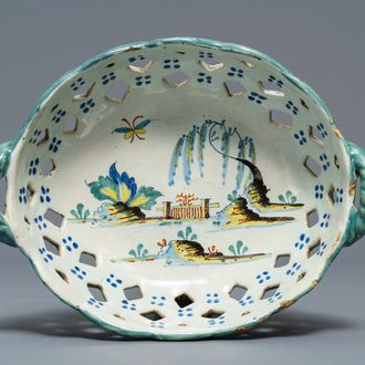 A polychrome Brussels faience 'landscape' basket, 18th C.