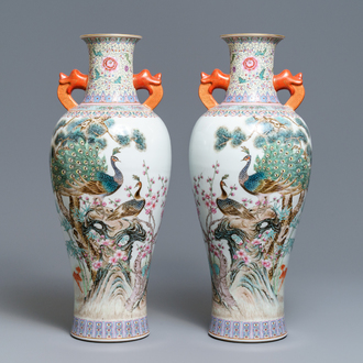 A pair of Chinese famille rose 'peacock' vases, Qianlong mark, Republic, 20th C.