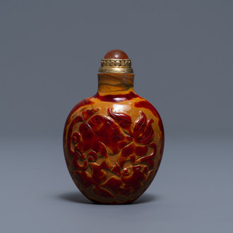 A Chinese carved realgar glass snuff bottle, Imperial Glassworks, Beijing, 1730-1840