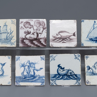 Acht blauw-witte en mangane Delftse tegels met schepen en zeewezens, 17/18e eeuw