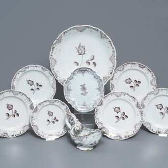 A manganese Dutch Delft part service with a sauce boat on stand, a dish and six plates, 18th C.