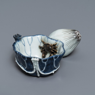A Chinese underglaze blue and copper-red 'crab and lotus' water dropper, Kangxi