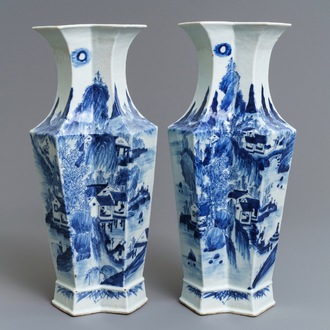 A pair of Chinese blue and white 'landscape and calligraphy' vases, 19th C.