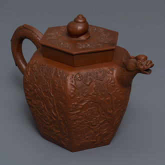A large Chinese Yixing stoneware teapot with applied design, Kangxi