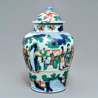 A Chinese wucai baluster vase and cover with playing boys, Transitional period