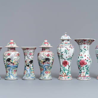 Two Chinese famille rose vase garnitures, Qianlong and 19th C.