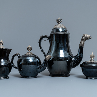 A four-piece silver-mounted Namur black-glazed pottery coffee service, 18th C.