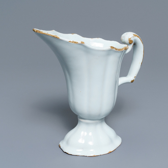 A white Dutch Delft ribbed helmet-shaped jug, 18th C.