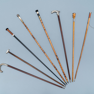 Eight canes incl. swords, daggers, dice and silver handles, 19th C.