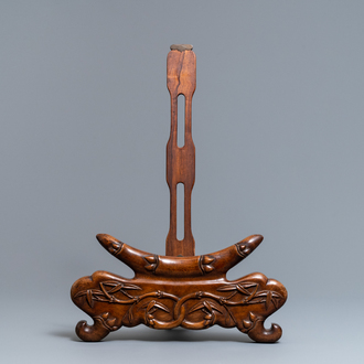 A Chinese carved hongmu dish stand, Qing