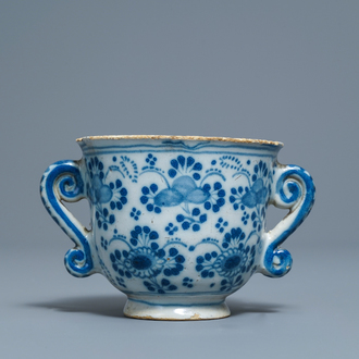 A Dutch Delft blue and white two-handled cup, 18th C.