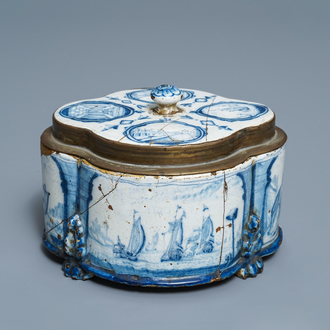A Dutch Delft blue and white quatrefoil box and bronze-mounted cover, early 18th C.