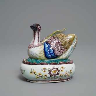 A polychrome Dutch Delft 'plover' butter tub and cover, 18th C.