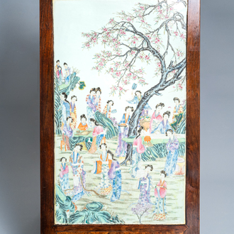 A large Chinese famille rose plaque inset in a wooden table, Republic, 20th C.