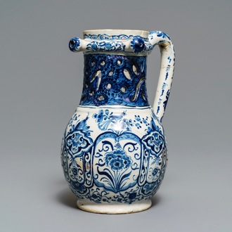 A Dutch Delft blue and white puzzle jug, dated 1737