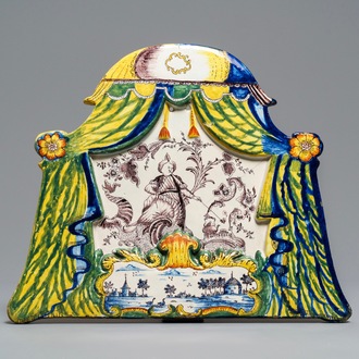 A large polychrome Dutch Delft plaque with a smoking Turk, 18th C.