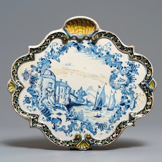 A polychrome Dutch Delft plaque with ships at sea, 18th C.