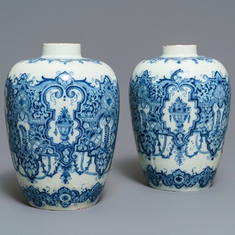 A pair of Dutch Delft blue and white Daniel Marot style vases, early 18th C.