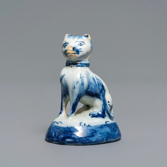 A Dutch Delft blue and white miniature model of a cat, 18th C.