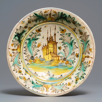 A polychrome Spanish dish with a castle in a landscape, Talavera, 17/18th C.