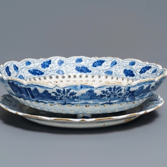 A Dutch Delft blue and white strawberry strainer on stand, 18th C.