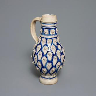 A large German stoneware jug with applied floral design, Westerwald, 17th C.