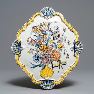 A large polychrome Dutch Delft 'flower vase' plaque, 18th C.