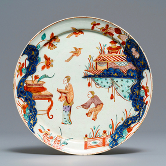 A Dutch Delft doré chinoiserie plate, early 18th C.