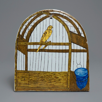 Une plaque en faïence polychrome de Delft à décor trompe l'oeil d'un cage à oiseaux, 18ème