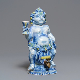 A polychrome Brussels faience 'Bacchus on a wine barrel' table fountain, 18th C.